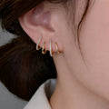 Yasmin | Boucles d’oreilles style griffe avec zircons